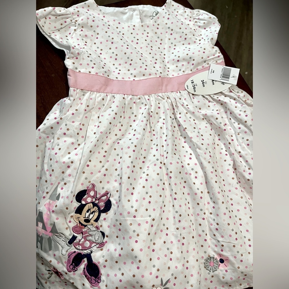 New! Disney babygirl dress. Size 24 months. Two pieces. Dress and headband.